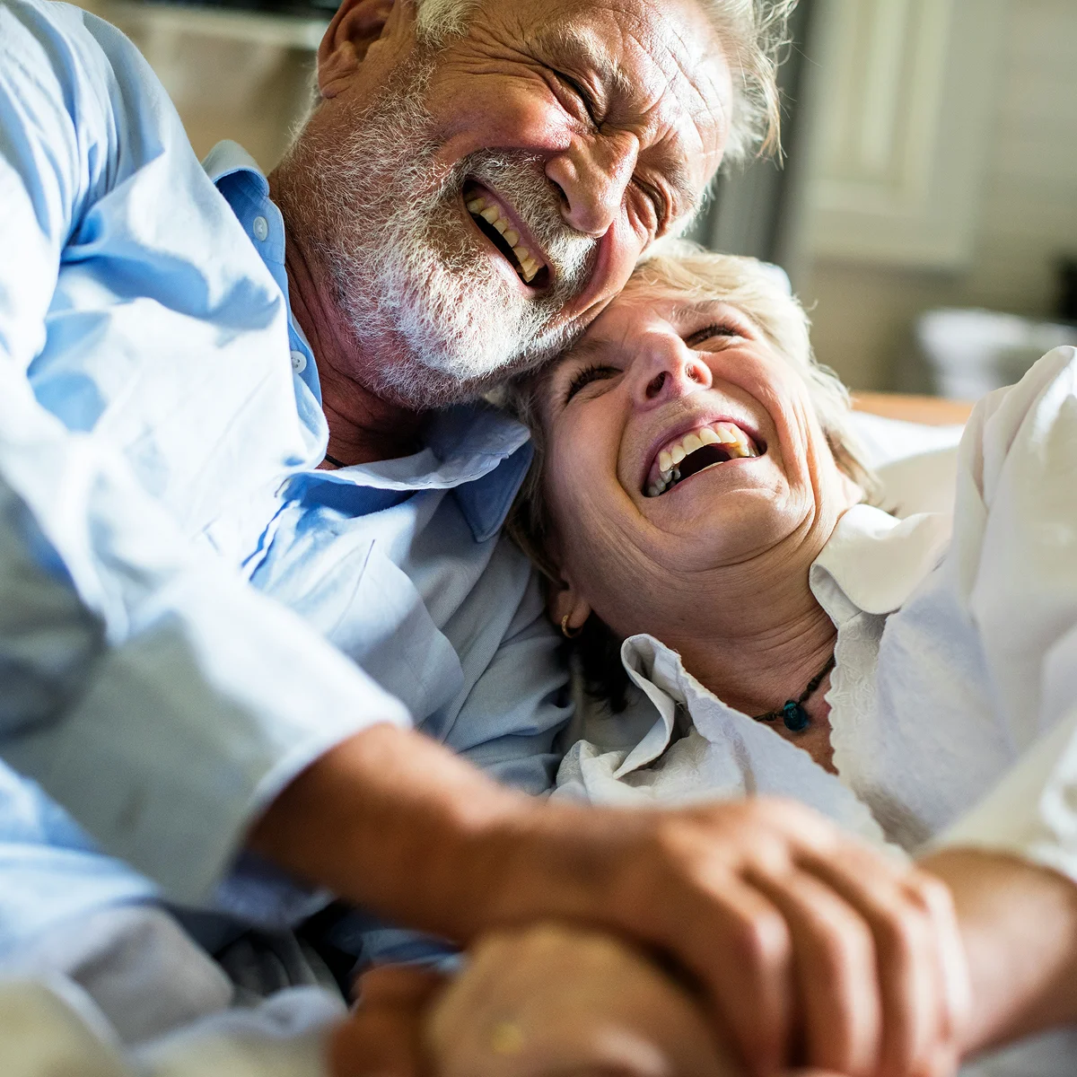 Older couple laughing together